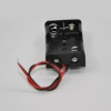 Two AA battery boxes, uncovered with wires, black power supply, positive and negative DC power supply, student experiment science physics details Picture